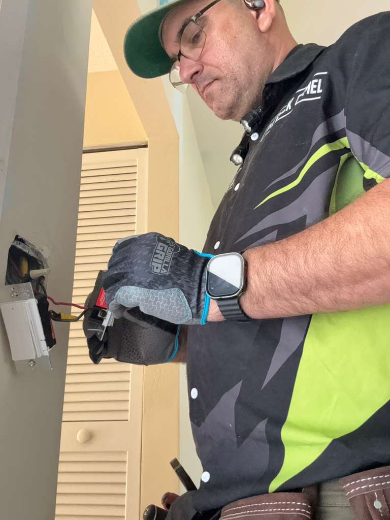 A contractor is installing or working on a GFCI/breaker.